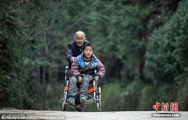 Dedication Shi Yuying pictured has pushed her grandson Jiang Hao m