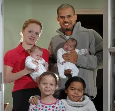 White and couple with mixed twins black