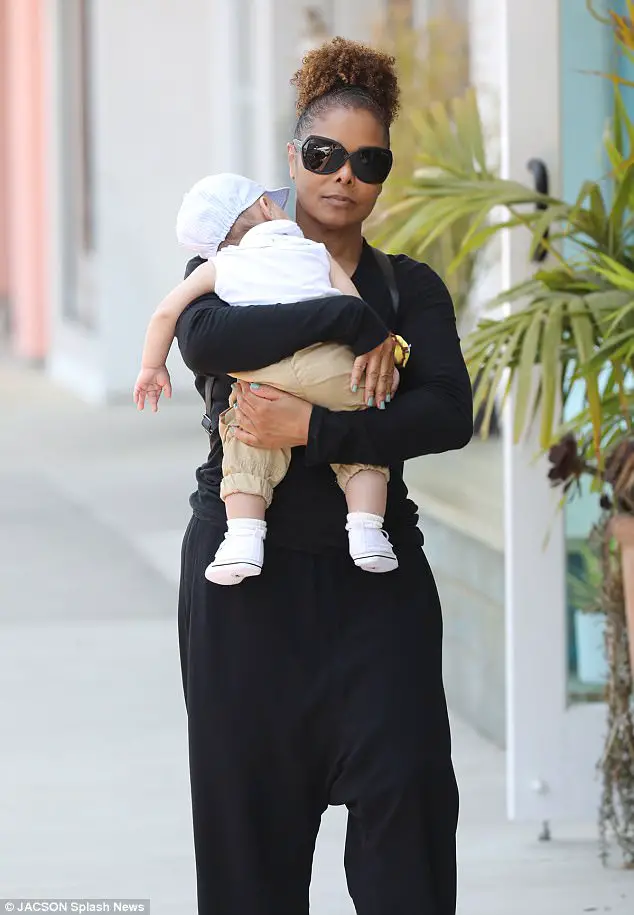 Smiling Janet Jackson Carries Sleeping Son Eissa Out In LA