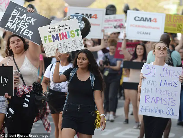 Amber Rose Dons Platinum Wig And Superhero Costume For Third Annual Sl*tWalk