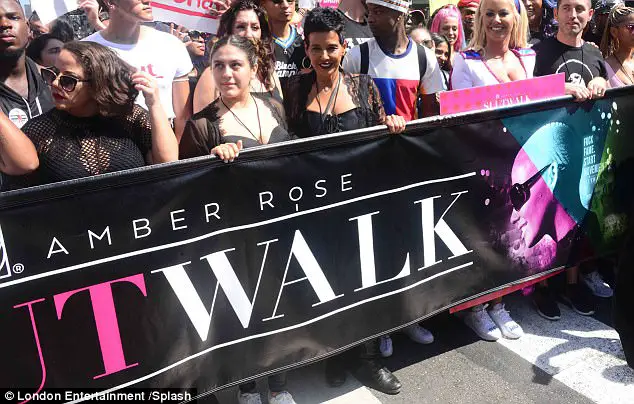 Amber Rose Dons Platinum Wig And Superhero Costume For Third Annual Sl*tWalk