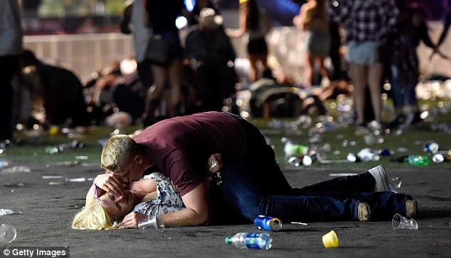 Mystery Couple Pictured Lying On The Ground As Bullets Flew In Vegas Massacre Managed To Flee