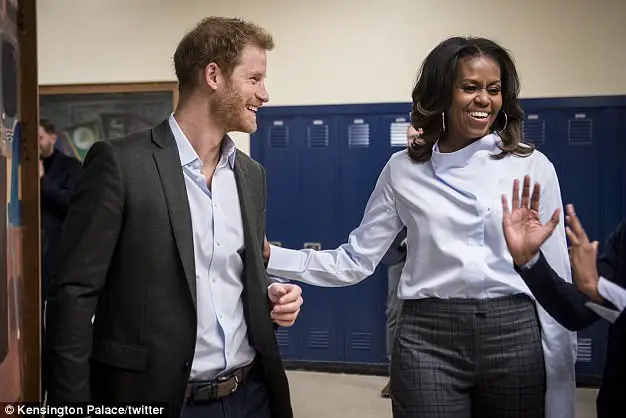 Prince Harry Leaves A Group Of Teen Girls Swooning As He Surprises Them With A Visit At Their Chicago School With Michelle Obama