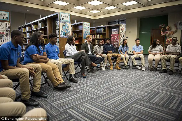 Prince Harry Leaves A Group Of Teen Girls Swooning As He Surprises Them With A Visit At Their Chicago School With Michelle Obama
