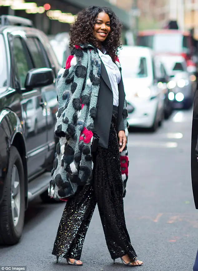 Gabrielle Union Glows In Bold Yellow Coat And Thigh-High Boots As She Steps Out In New York