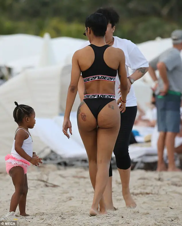 Teyana Taylor Shows Off Her Stunning Figure With Daring High-Cut Bikini As She Enjoys A Beach Day With Her Family