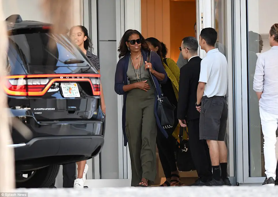 Michelle Obama Looks Sensational In White Bikini And Cut-Off Shorts As She And Daughter Malia Enjoy Winter Weekend At The Beach
