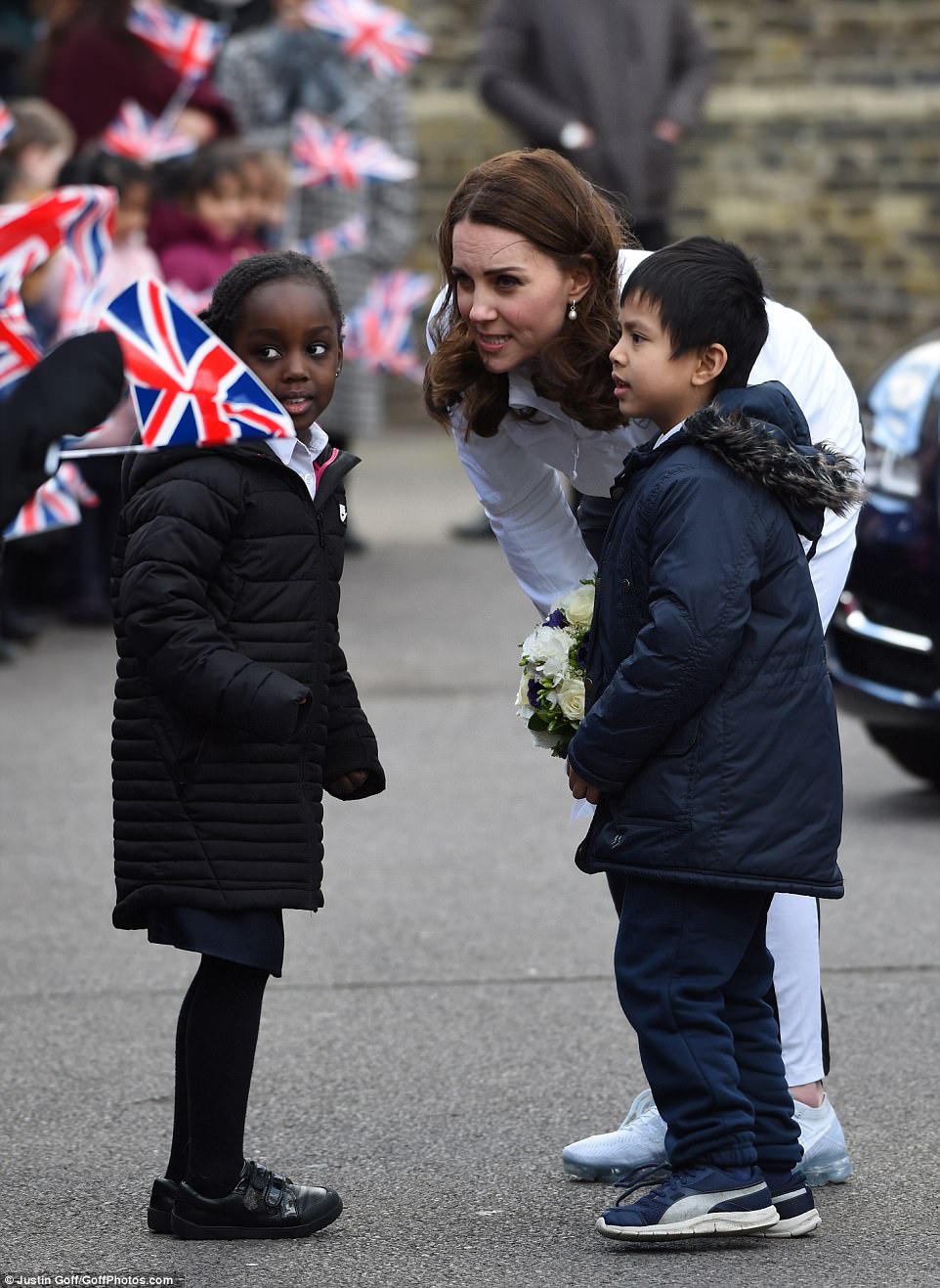 Adorable Moment Schoolchildren Line Up To Shake The Duchess' Hand - Then Go In For Bear Hugs Instead