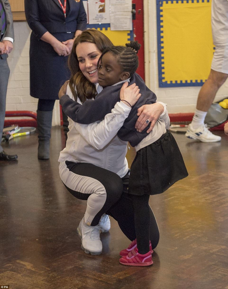 Adorable Moment Schoolchildren Line Up To Shake The Duchess' Hand - Then Go In For Bear Hugs Instead