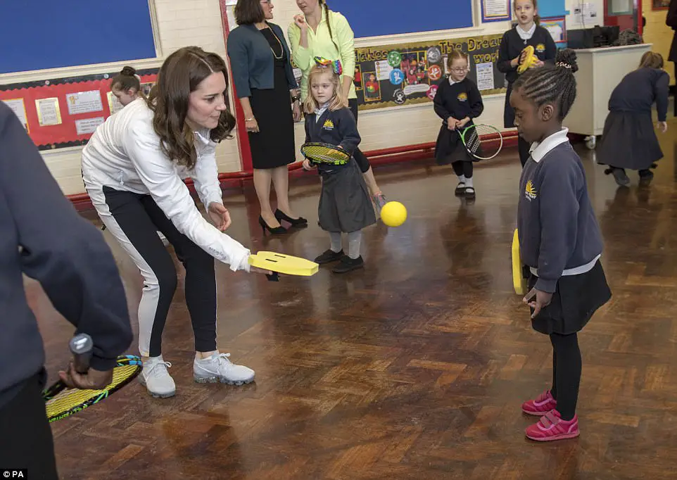 Adorable Moment Schoolchildren Line Up To Shake The Duchess' Hand - Then Go In For Bear Hugs Instead