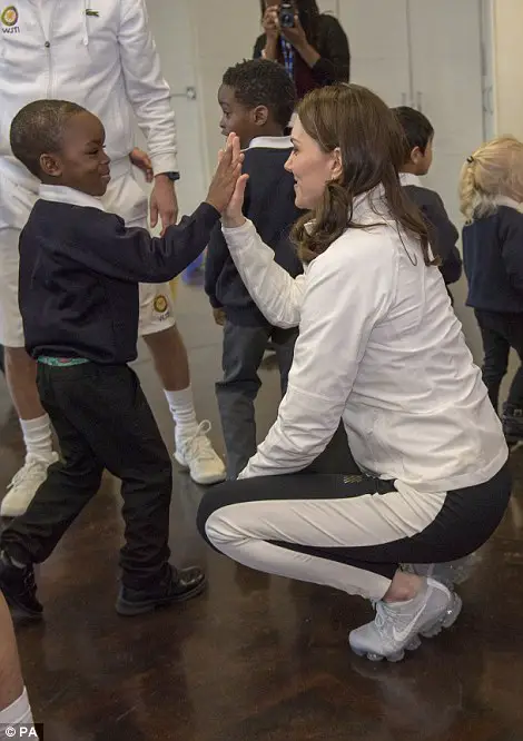 Adorable Moment Schoolchildren Line Up To Shake The Duchess' Hand - Then Go In For Bear Hugs Instead