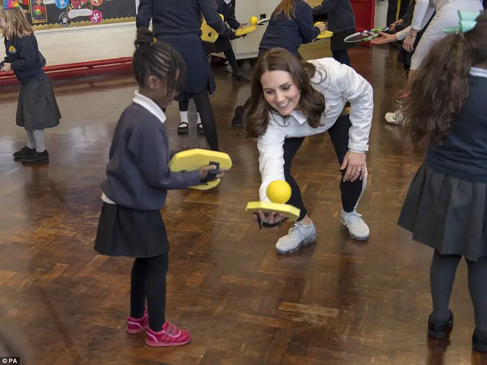 Adorable Moment Schoolchildren Line Up To Shake The Duchess' Hand - Then Go In For Bear Hugs Instead