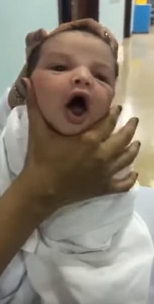 Nurses Spark Outrage As They Film Themselves Squashing A New-Born Baby's Face.
