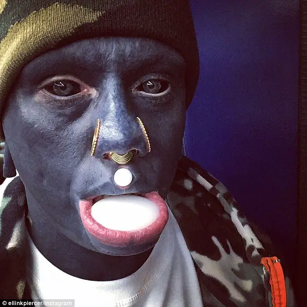 'Body Modification Artist' Has Spent Ten Years Tattooing His Body Black - Including The Inside Of His MOUTH And The Whites Of His EYES
