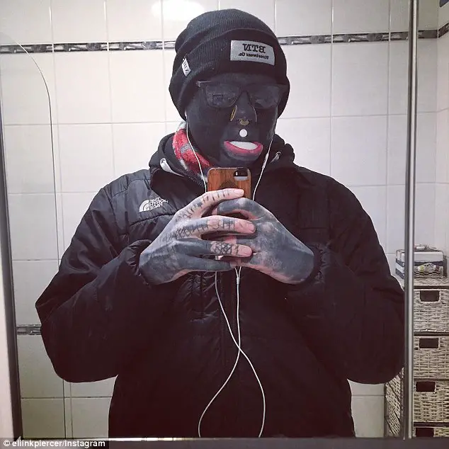 'Body Modification Artist' Has Spent Ten Years Tattooing His Body Black - Including The Inside Of His MOUTH And The Whites Of His EYES