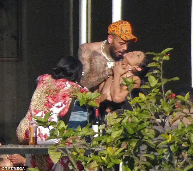 Chris Brown Grips Hands Around Woman's Neck - Both Say It Was Playful - You Be The Judge!