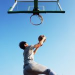 man playing basketball