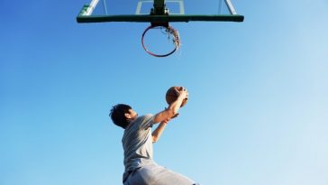 man playing basketball
