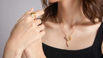 A woman wearing a necklace.